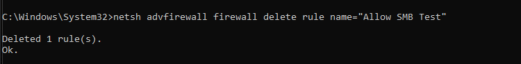 Windows PowerShell showing deletion of one firewall rule named Allow SMB Test.